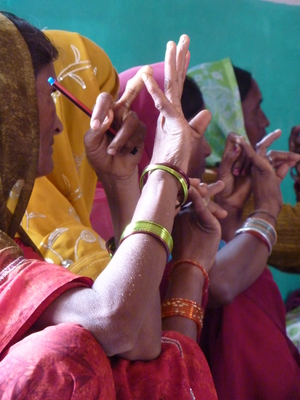 women_participating_in_a_village_meeting_photo_by_eve_5509860879_o.jpg